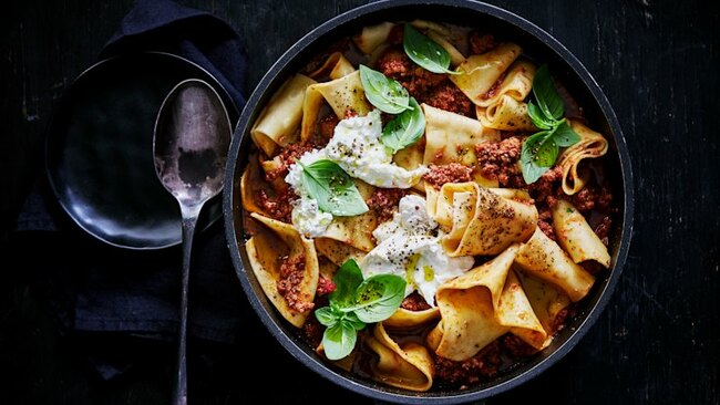 Oven-baked pork and veal ragu with rag pasta and burrata