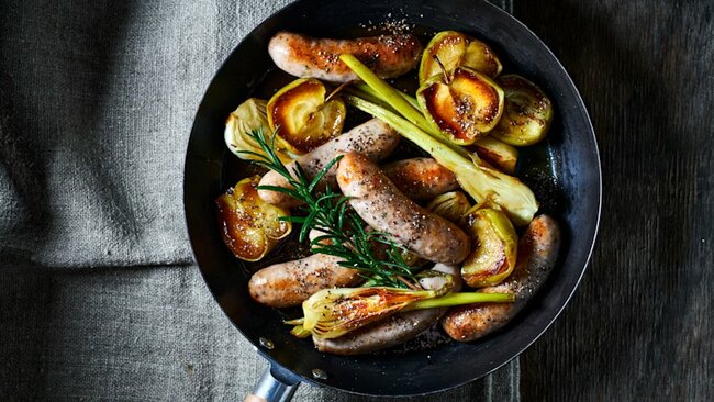 Cider-braised sausages with apple, fennel and rosemary