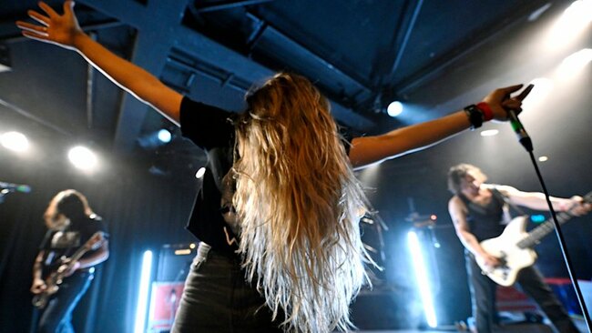 Headbanging and handstands as hometown heroes go hard at tour closer