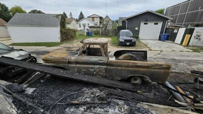 Family devastated after fire destroys garage and vintage truck