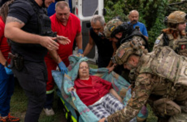Russian strike kills 21 people queuing for pensions in Ukraine