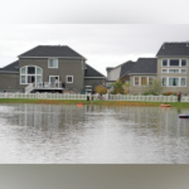 100 Year Flood: Weekend storm flooded homes, streets, parks and parking lots