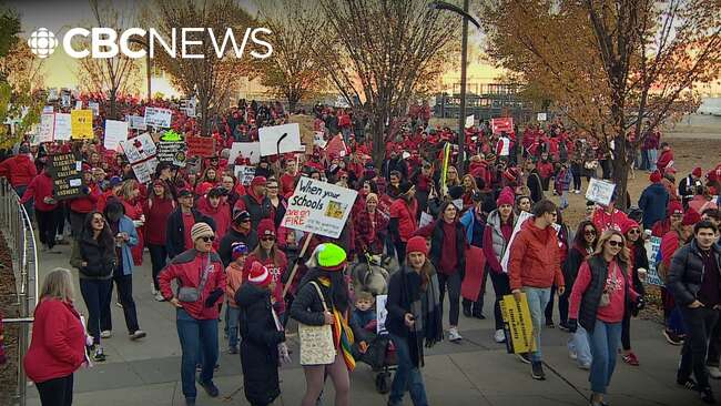 Thousands of teachers rally downtown as the Premier addresses the province