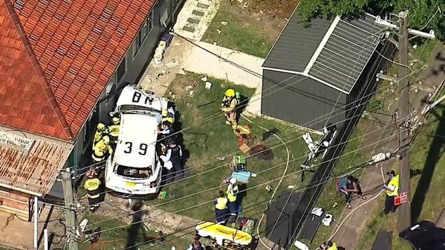 Police officer trapped following two-car crash