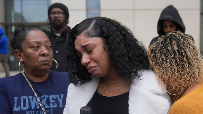 The partygoers had gathered around to cut the cake. Then came a popping sound