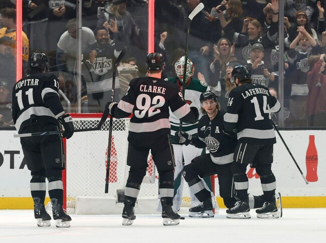Kings hang on to beat Wild in shootout