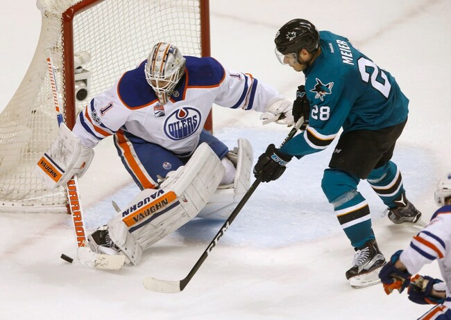 Sharks add goalie, defenseman in trade with Chicago Blackhawks