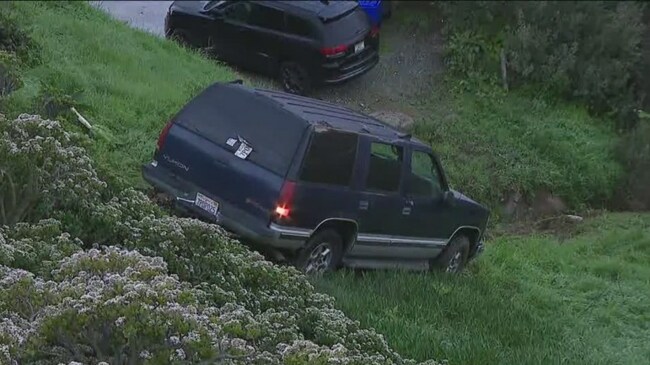 Police chase ends with SUV plunging into Hillcrest canyon