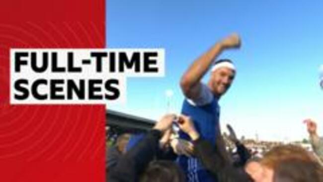 Macclesfield fans invade the pitch after beating Palace