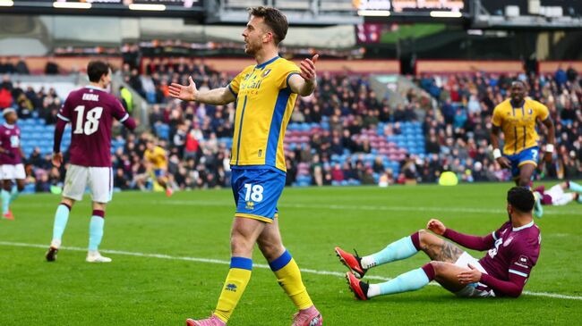 Mansfield cause FA Cup upset by dumping Burnley out