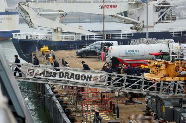HMS Dragon preparations continue as Royal Navy Merlin surveillance helicopter arrives in Cyprus