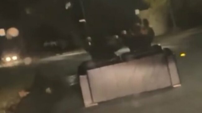 Canberra driver captures couch being driven down street
