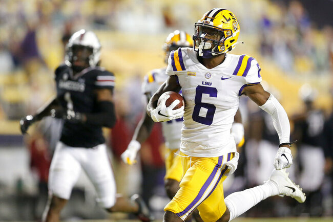 Panthers trade back twice, select LSU wide receiver Marshall