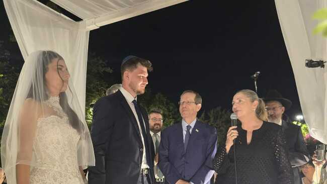Isaac Herzog attends wedding of former Gaza hostages released from Hamas captivity