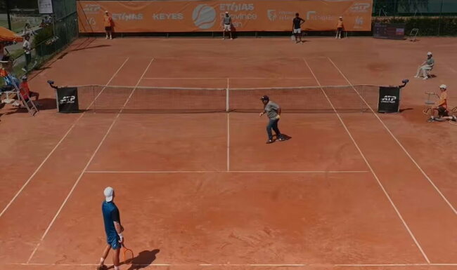 Bizarre Scene Unfolds as Maintenance Worker Interrupts ATP Pro Mid-Serve