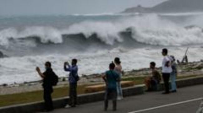 East Asia braces for destructive typhoon as landslides kill 15 in Philippines