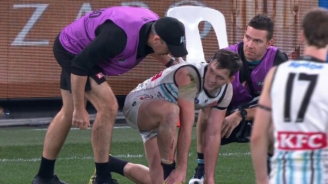 Port gun goes down with ankle injury
