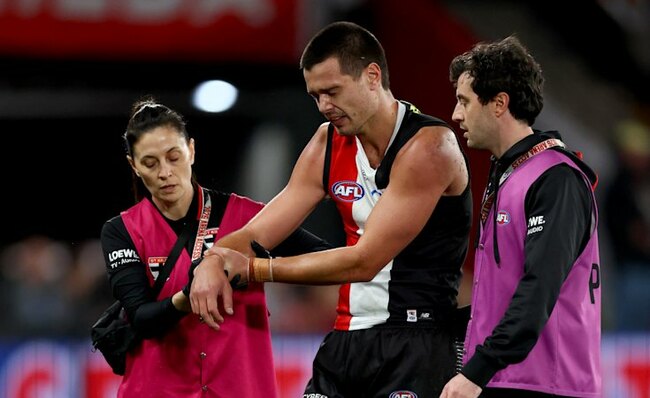 AFL Live: Australia, Ireland off to a fast start in AFLW blockbuster; injury carnage overshadows Swans’ win over Saints