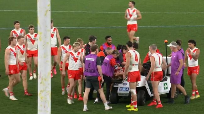 Swans young gun stretchered off