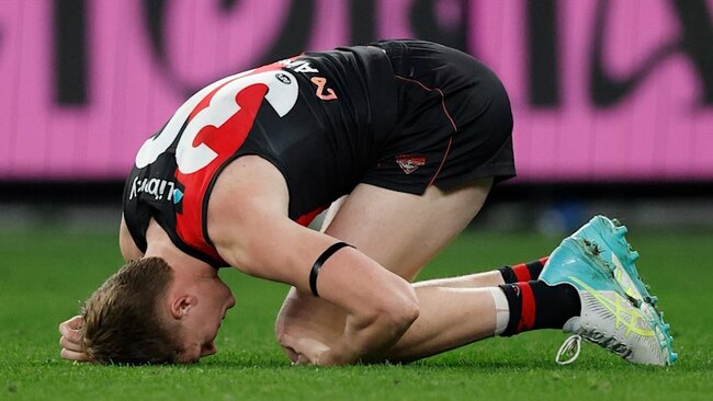 Young Bomber suffers concussion in friendly fire clash; Demons grind out win on Gold Coast; Tigers off the bottom