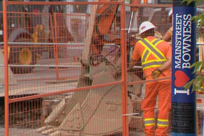 Bowness businesses contend with sinkhole after another Calgary water main break