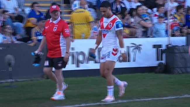 Holmes limps off with leg injury