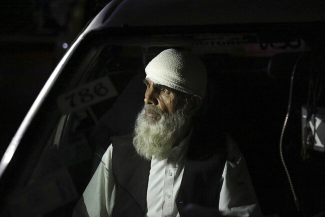 Suicide truck bomber hits Afghan guest house, killing 21