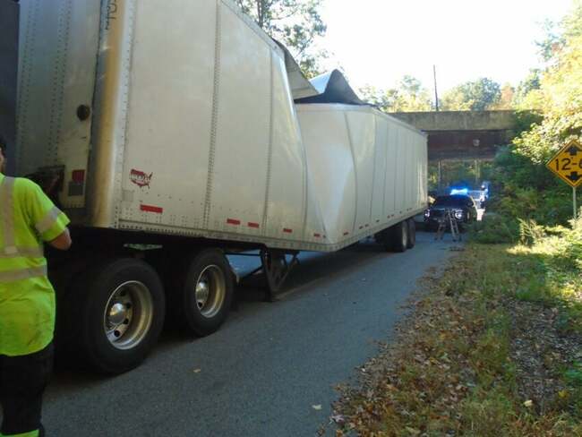 Driver from Utah scrunches his truck on MBTA bridge, blames GPS
