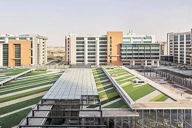 Embassy REIT: Maintain 'buy', lower TP to Rs 380