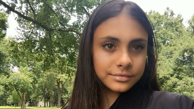 Man hands himself in after woman found dead in Melbourne apartment