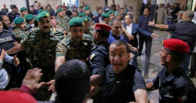 7 dead, 40 wounded after gunmen open fire at funeral in Jordan - National