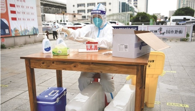 China says Covid vaccines are safe