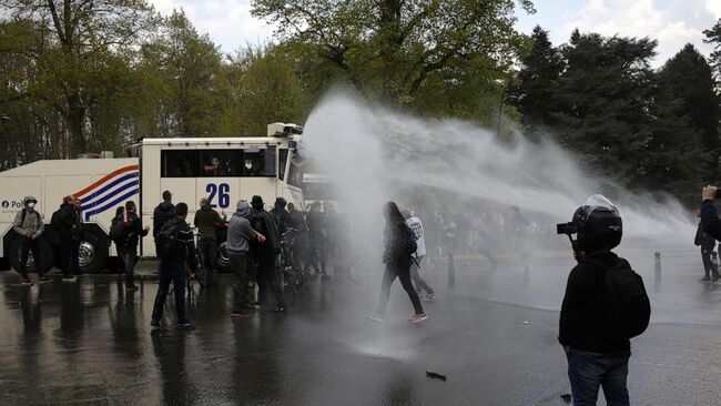 Belgium police, partiers clash anew over virus restrictions