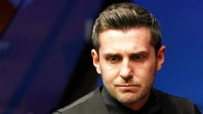 Selby edges ahead at Crucible as semi-final paused for overrunning