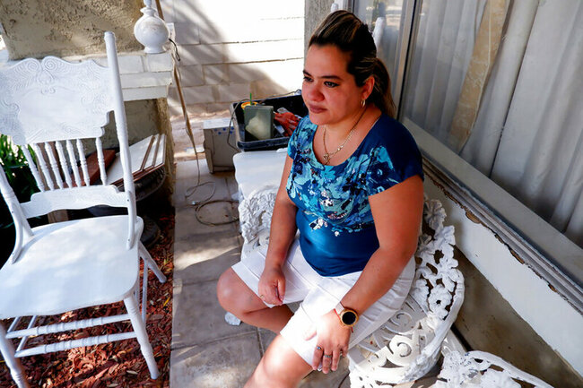 Laid-off workers lobby for return to jobs at pre-COVID wages