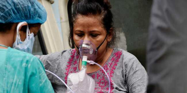 Former FDA commissioner said he's 'not sure' about Biden's India travel ban because COVID-19 variants are already in the US