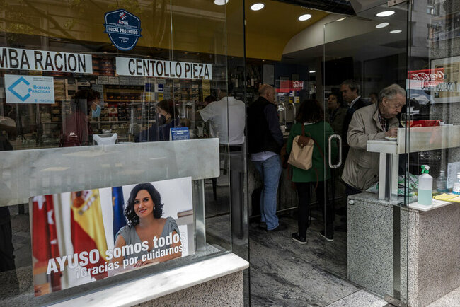 EXPLAINER: COVID-19, far-right are top themes in Madrid vote