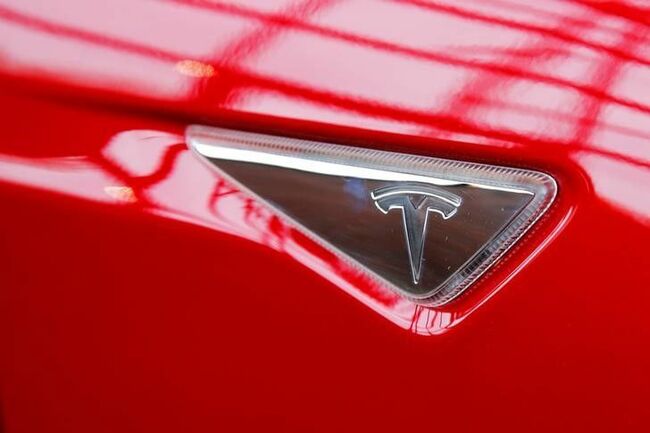Tesla, under scrutiny in China, steps up engagement with regulators, say sources