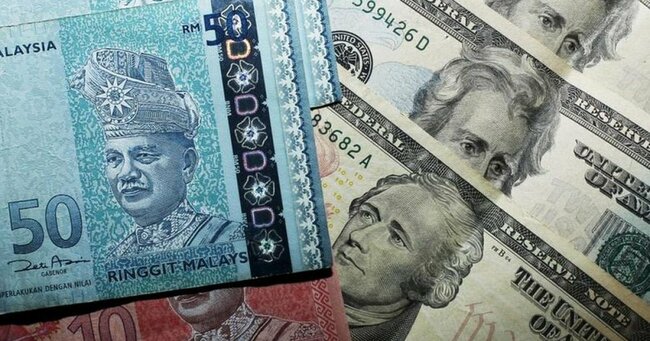 Ringgit ends lower against US dollar