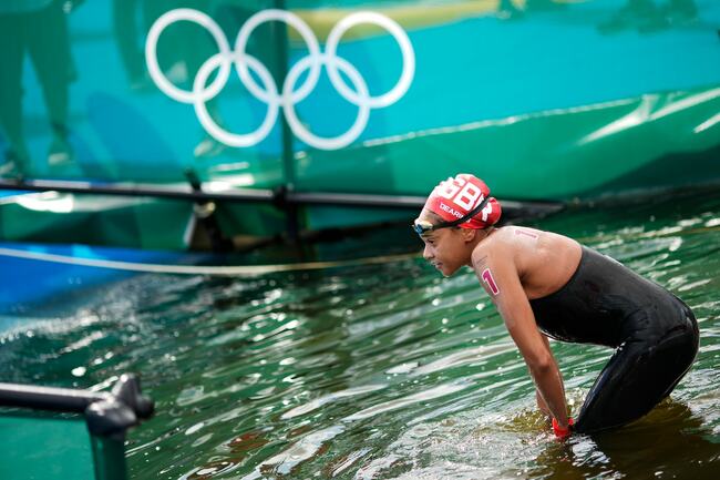 Olympic swimmer wins fight to reverse ban on cap made for Black hair