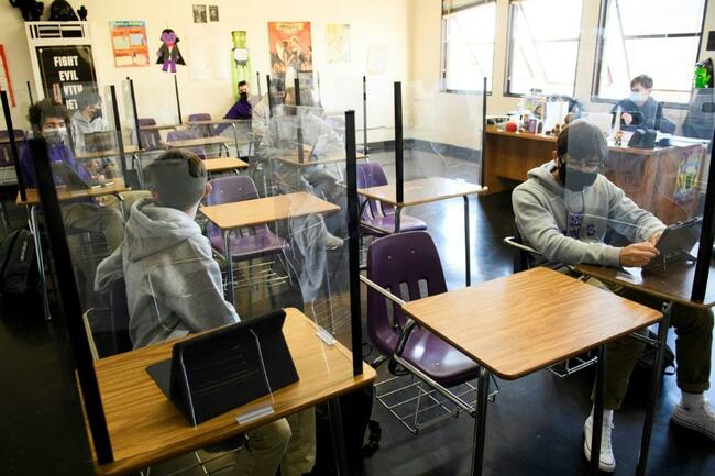 As virus rages globally, US to vaccinate low-risk teens