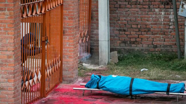 The Latest: Nepal extends lockdown for capital amid surge