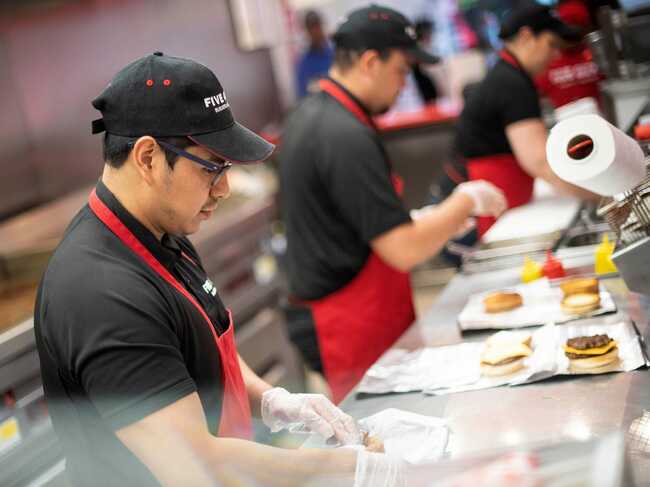 Five Guys has opened its first ghost kitchen, which only cooks food for delivery, as digital demand continues