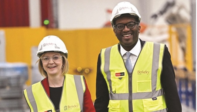 UK’s Kwarteng moves to calm investors with early budget date